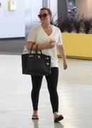 http://img221.imagevenue.com/loc1136/th_581365430_Hilary_Duff_after_her_workout_in_Century_City9_122_1136lo.jpg