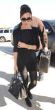 th_27620_celebrity_paradise.com_TheElder_VictoriaBeckham2010_03_15_atLAX47_122_898lo.jpg