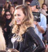 http://img221.imagevenue.com/loc1045/th_86835_Hilary_Duff_At_Extra_with_Mario_Lopez55_122_1045lo.jpg